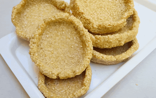 Crunchzilla authentic handmade Tilkut presented in clay serveware
